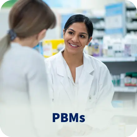 Pharmacist consulting with a patient. Pharmacy benefit management (PBMs) concept.